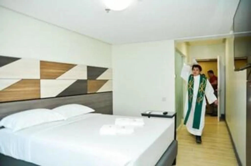 Bed in Travelite Hotel Legarda