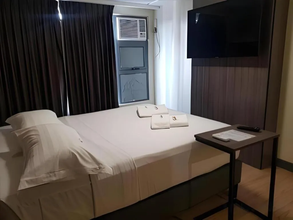 Bed in Travelite Hotel Legarda