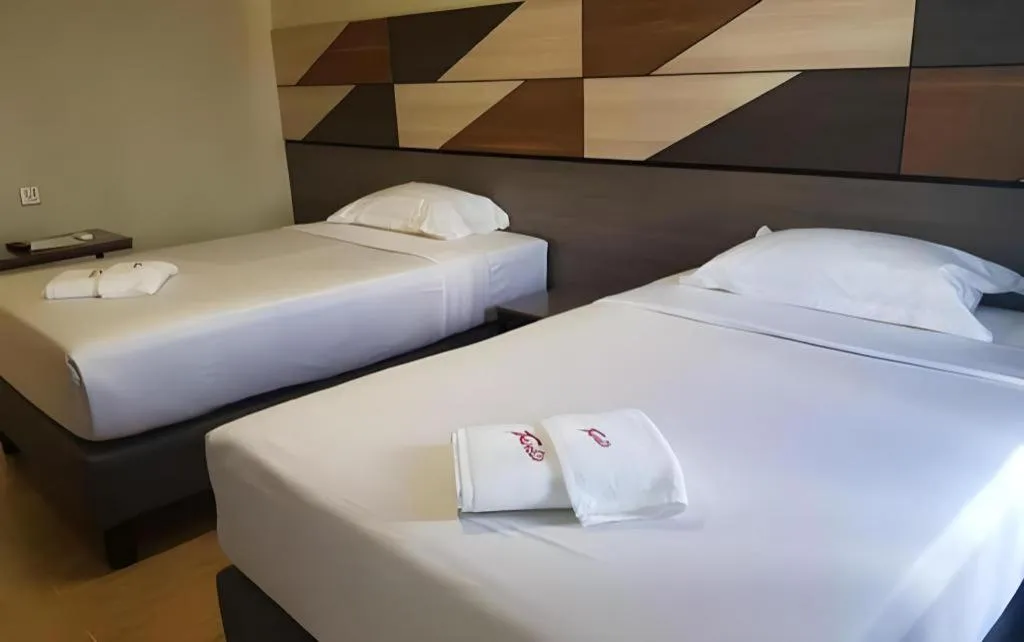 Bed in Travelite Hotel Legarda
