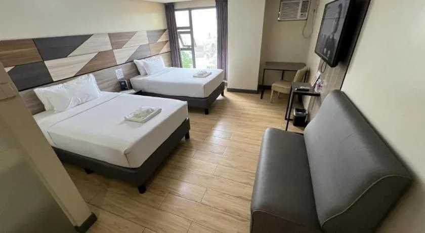 Bed in Travelite Hotel Legarda