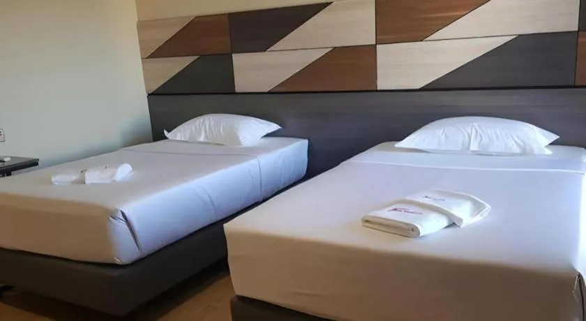 Bed in Travelite Hotel Legarda