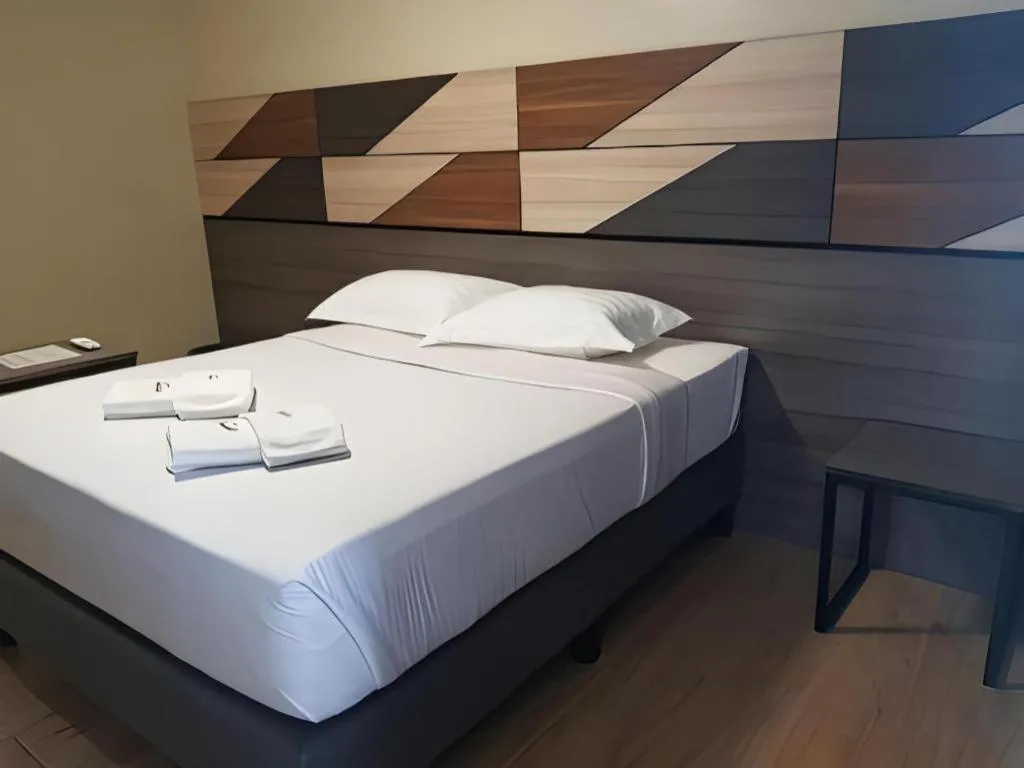 Bed in Travelite Hotel Legarda