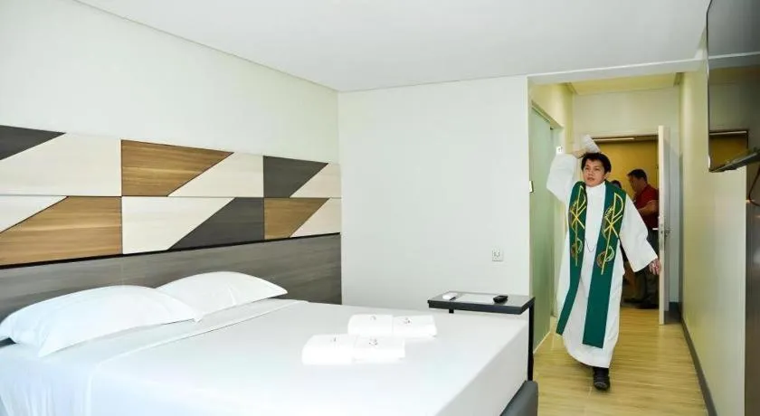 Bed in Travelite Hotel Legarda