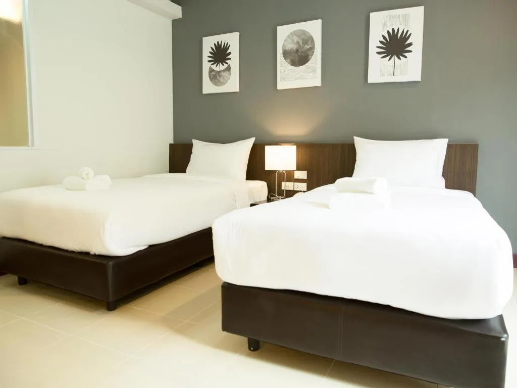 Bed in B2 Hat Yai Rat Uthit Boutique & Budget Hotel