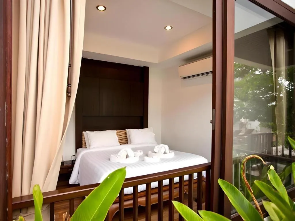 Bed in Maryoo Samui Hotel