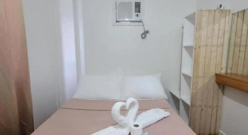 Bed in La Bella Casa Boracay Hotel