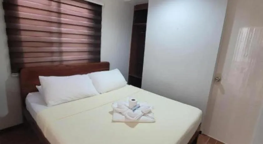 Bed in La Bella Casa Boracay Hotel