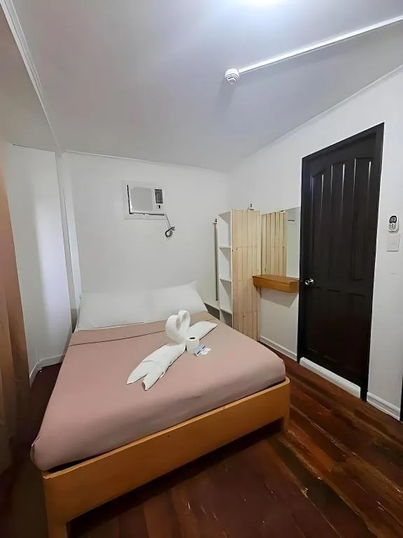 Bed in La Bella Casa Boracay Hotel