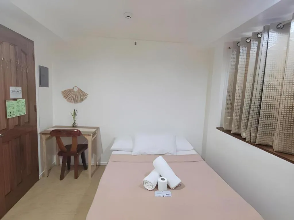 Bed in La Bella Casa Boracay Hotel