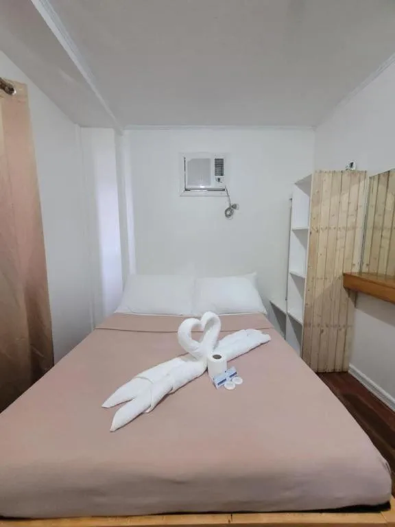 Bed in La Bella Casa Boracay Hotel