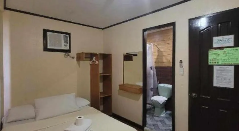 Bed in La Bella Casa Boracay Hotel