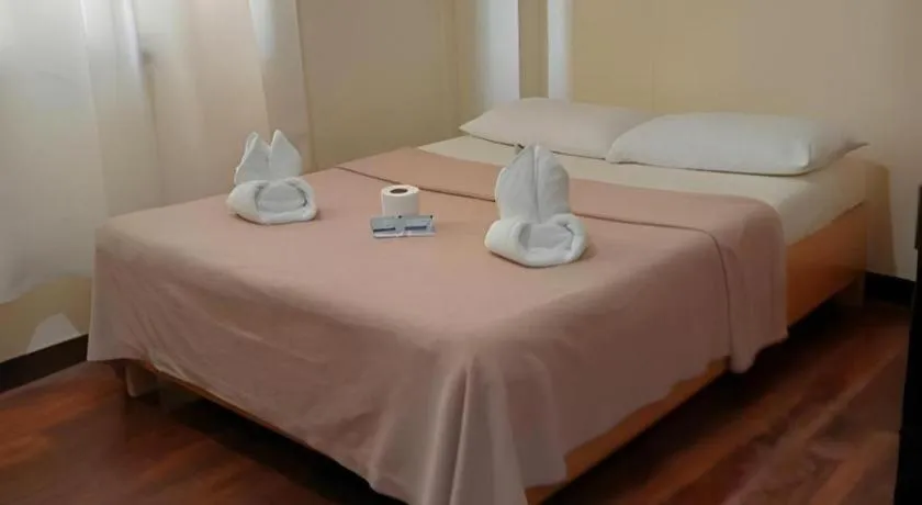 Bed in La Bella Casa Boracay Hotel