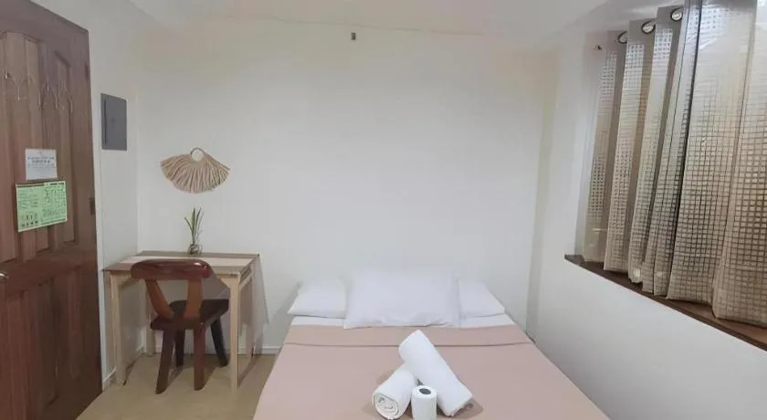 Bed in La Bella Casa Boracay Hotel