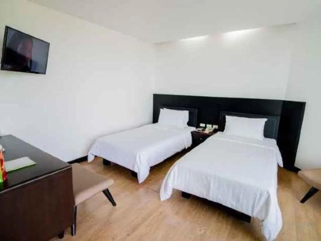 Bed in The Sez Hotel Bangsaen