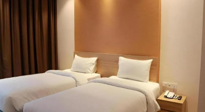 Bed in Wing Hotel Kualanamu Airport