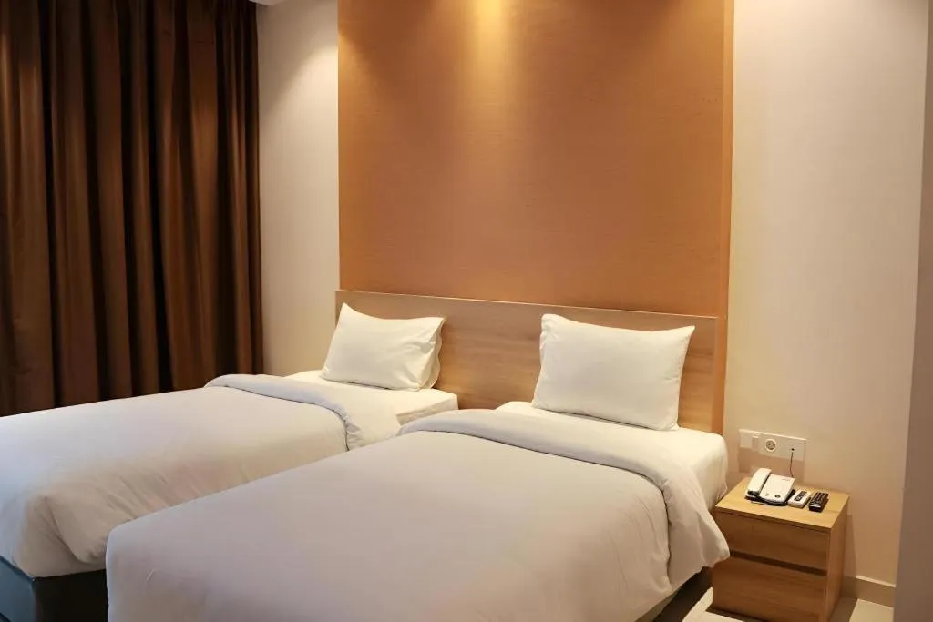 Bed in Wing Hotel Kualanamu Airport