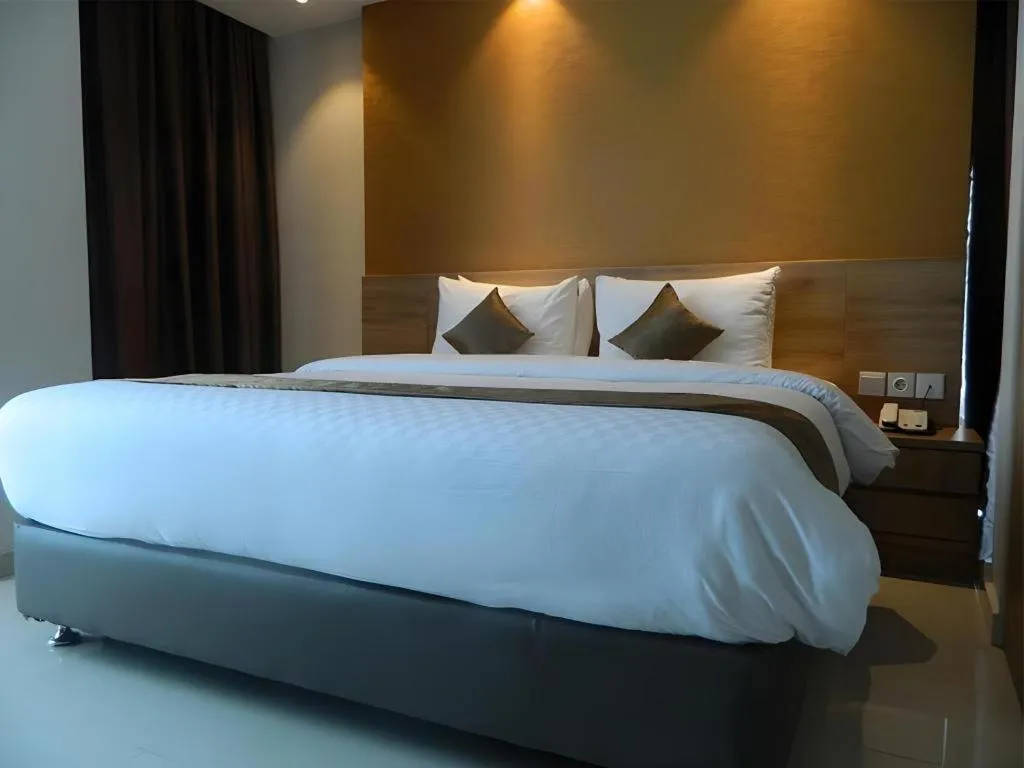 Bed in Wing Hotel Kualanamu Airport