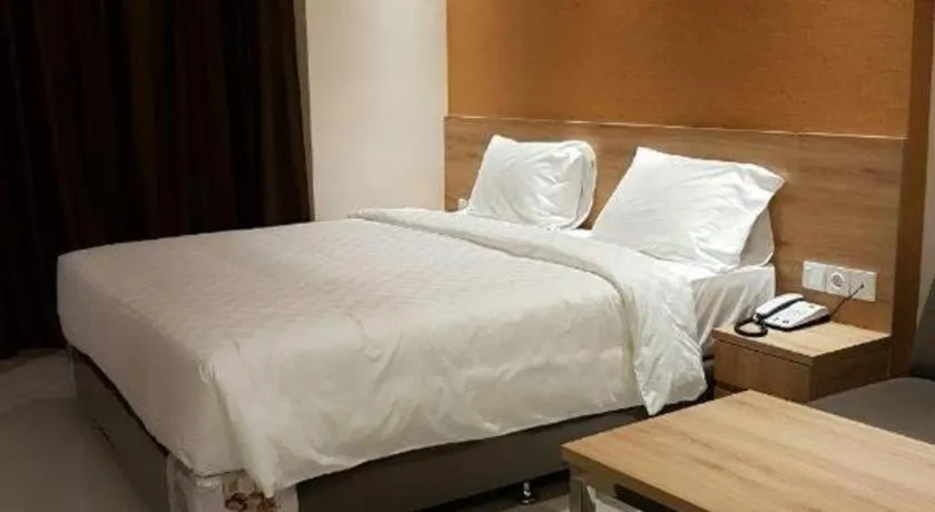 Bed in Wing Hotel Kualanamu Airport