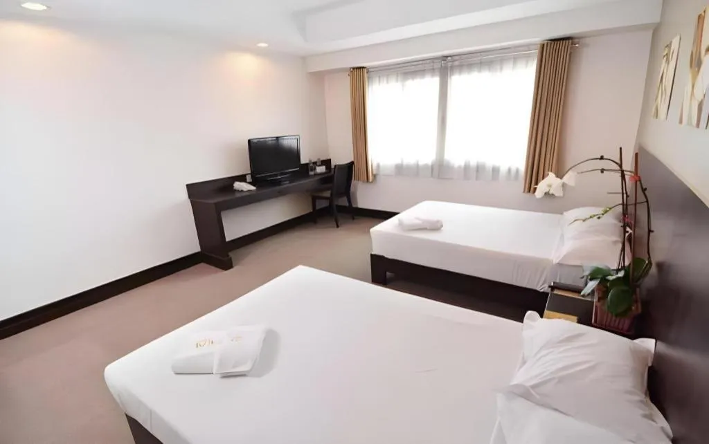 Bed in Citylight Hotel