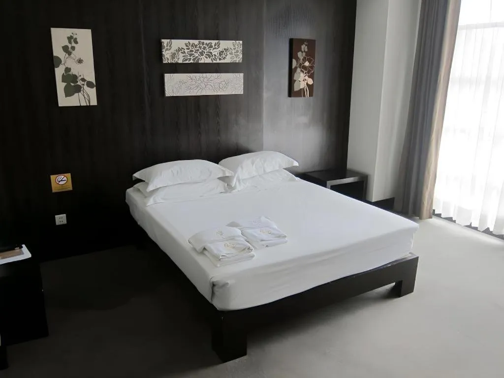 Bed in Citylight Hotel