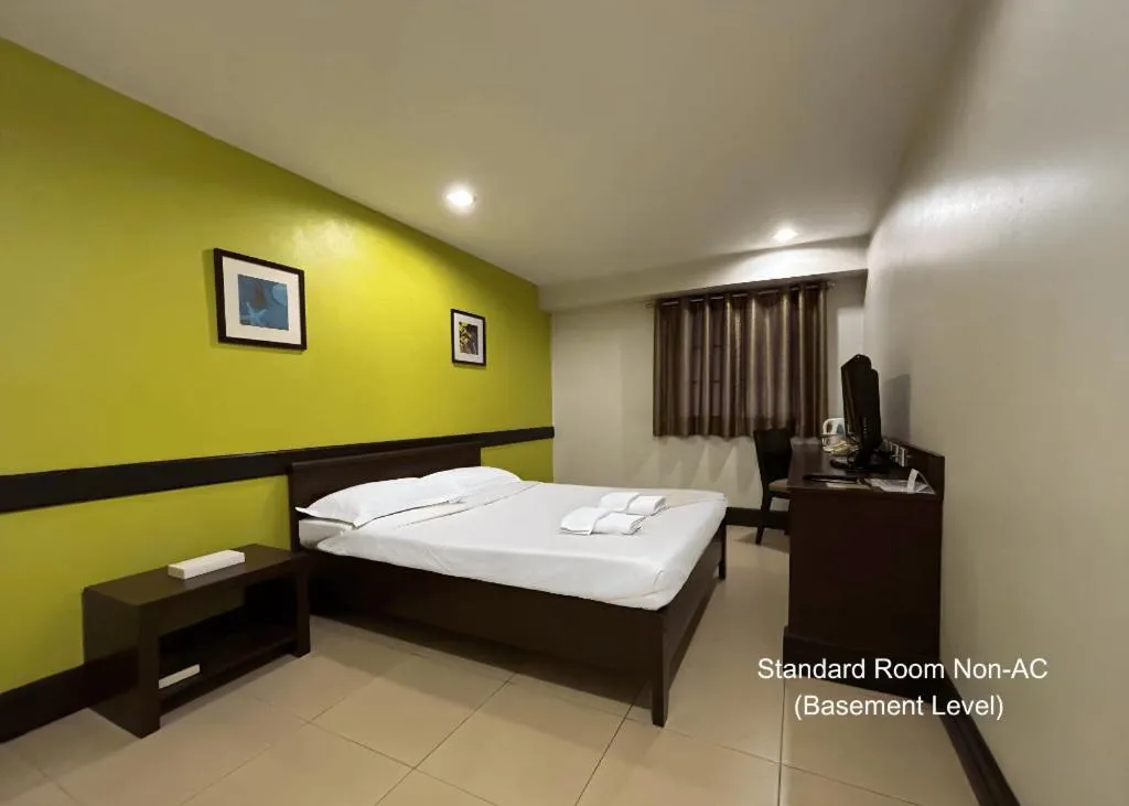 Bed in Citylight Hotel