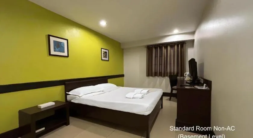 Bed in Citylight Hotel