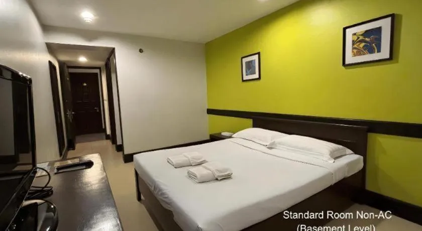 Bed in Citylight Hotel