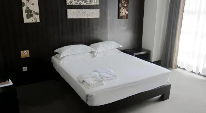 Bed in Citylight Hotel