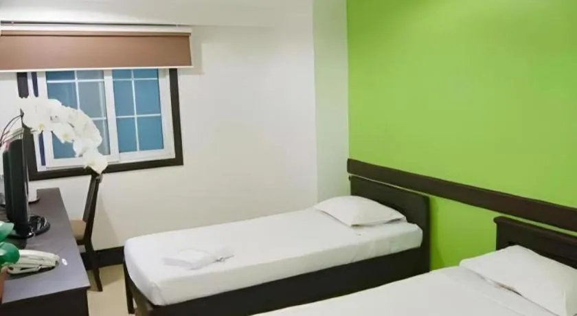 Bed in Citylight Hotel