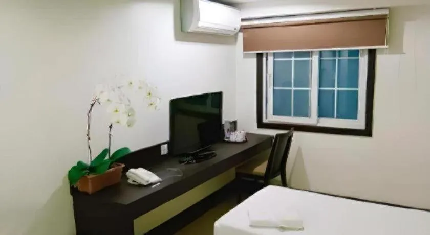 Bed in Citylight Hotel