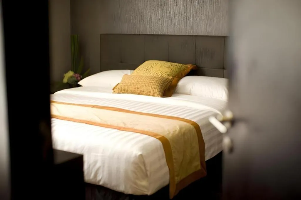 Bed in F1 Hotel Manila