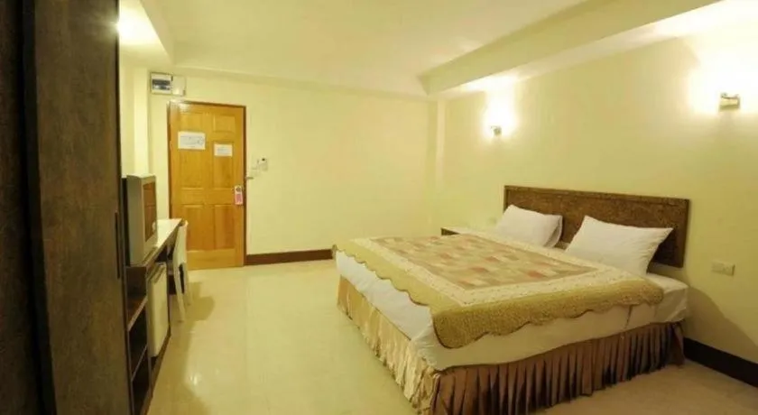 Bed in Trat Center Hotel