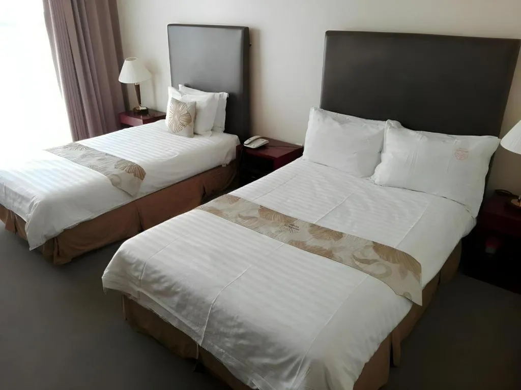 Bed in Hotel Sunshine