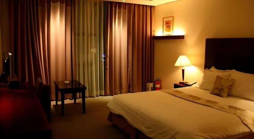 Bed in Hotel Sunshine