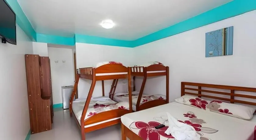 Bed in Palm Grove Saud Holiday Complex Hotel