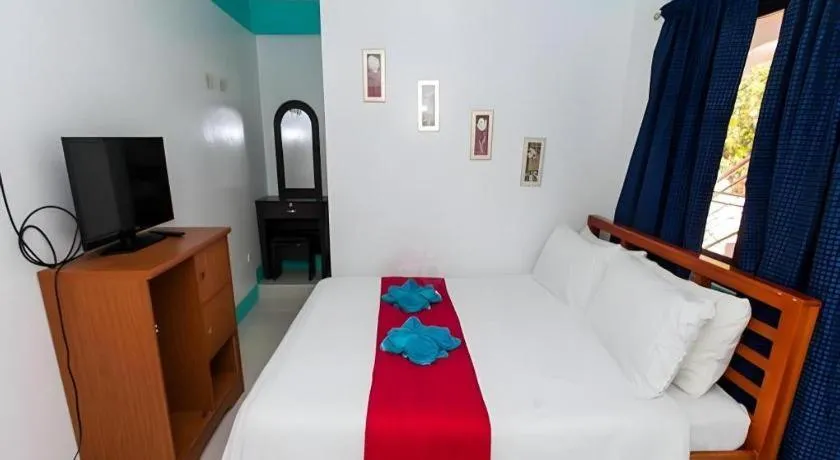 Bed in Palm Grove Saud Holiday Complex Hotel