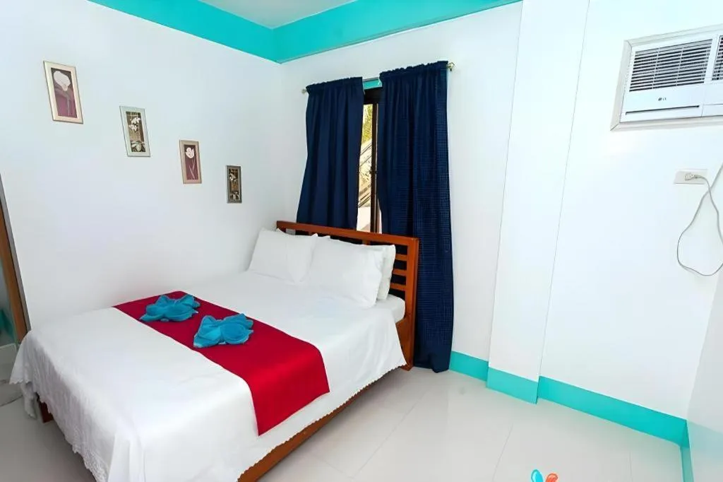 Bed in Palm Grove Saud Holiday Complex Hotel