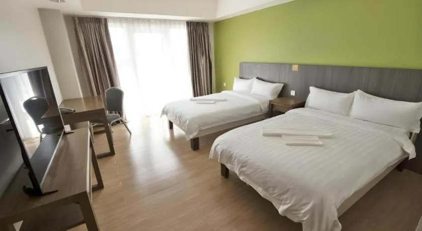 Bed in Newtown Plaza Hotel