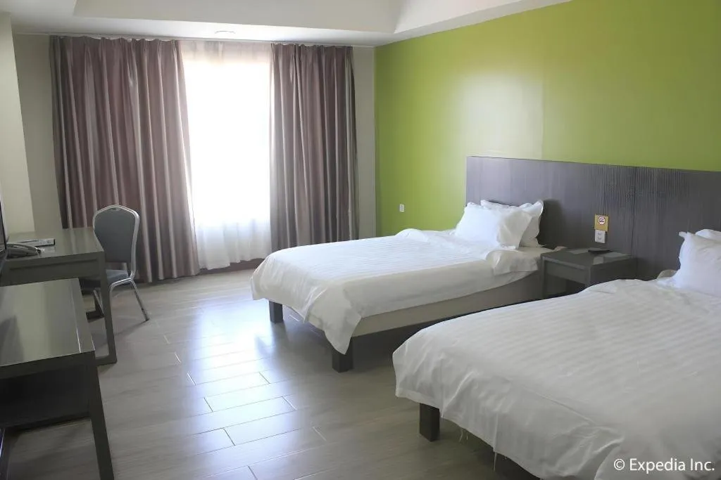 Bed in Newtown Plaza Hotel