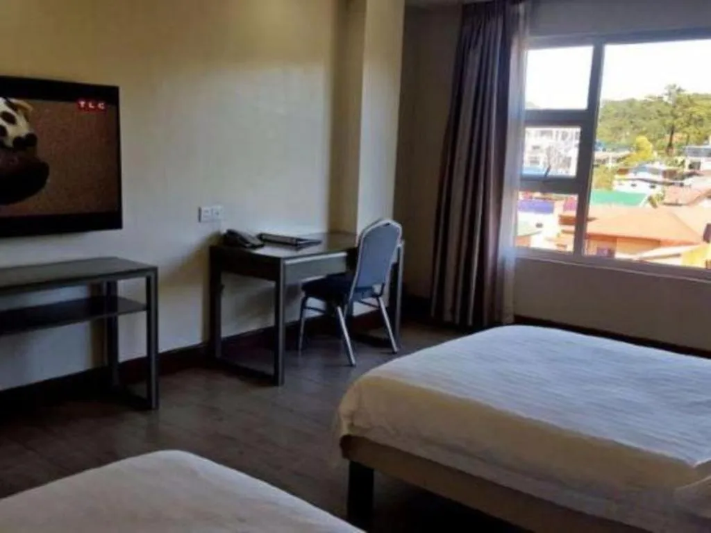 Bed in Newtown Plaza Hotel