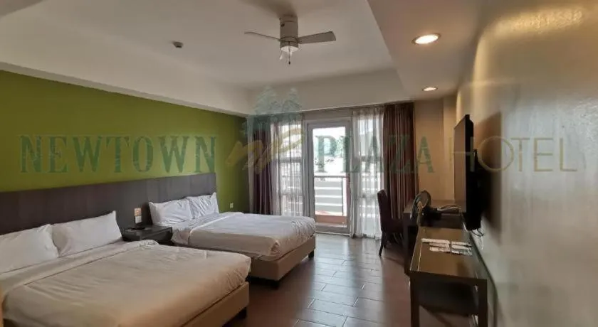 Bed in Newtown Plaza Hotel