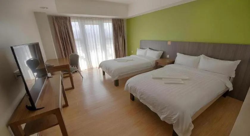 Bed in Newtown Plaza Hotel