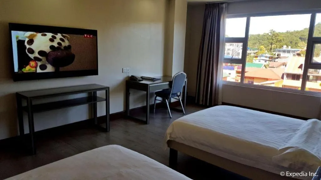 Bed in Newtown Plaza Hotel