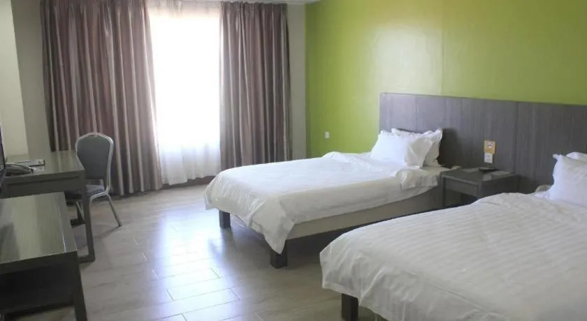 Bed in Newtown Plaza Hotel