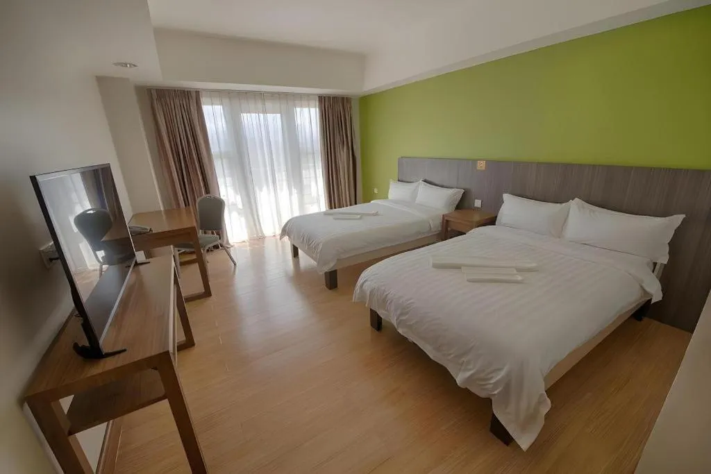 Bed in Newtown Plaza Hotel