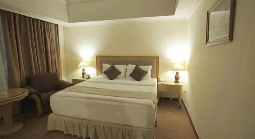 Bed in Oasis Amir Hotel