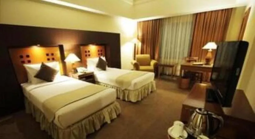 Bed in Oasis Amir Hotel