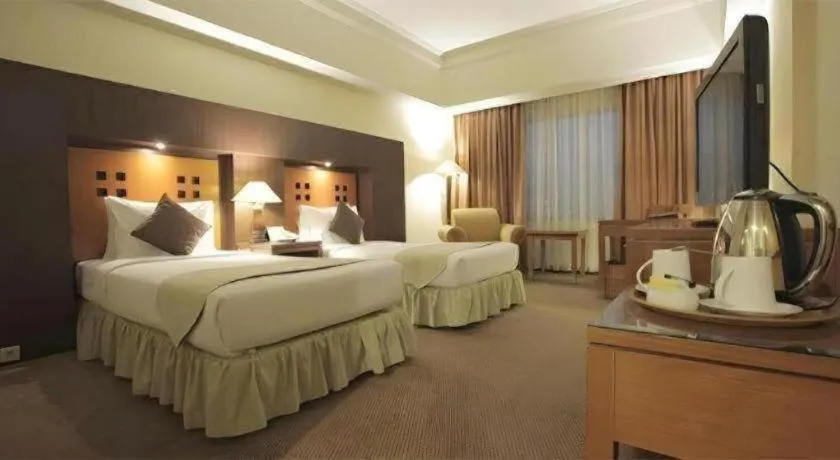 Bed in Oasis Amir Hotel