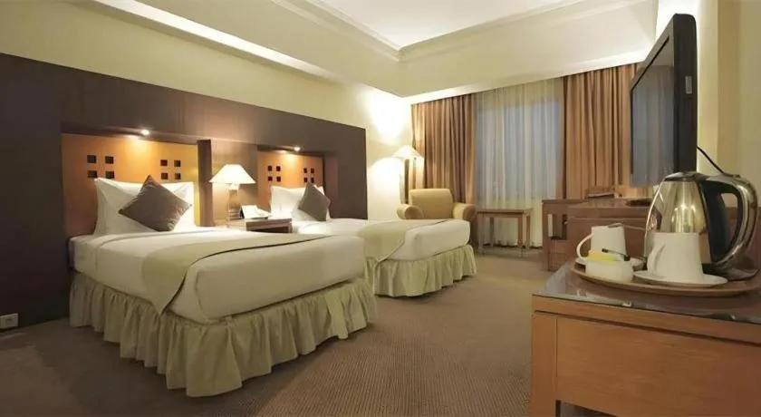 Bed in Oasis Amir Hotel