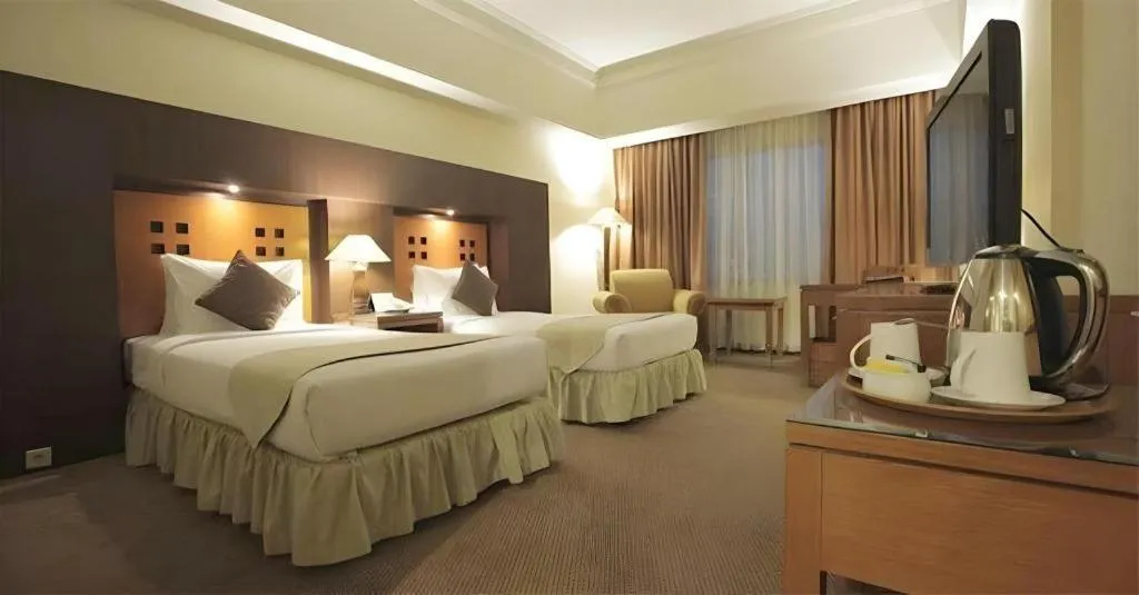 Bed in Oasis Amir Hotel